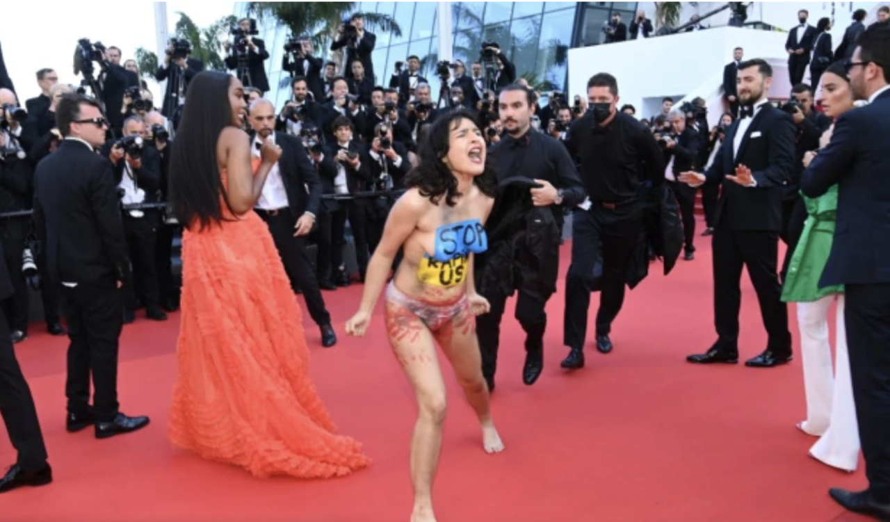 Topless Protester Disrupts Cannes: ‘Three Thousand Years of Longing’ Red Carpet